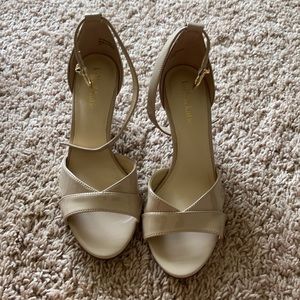 Women's heels, never worn.